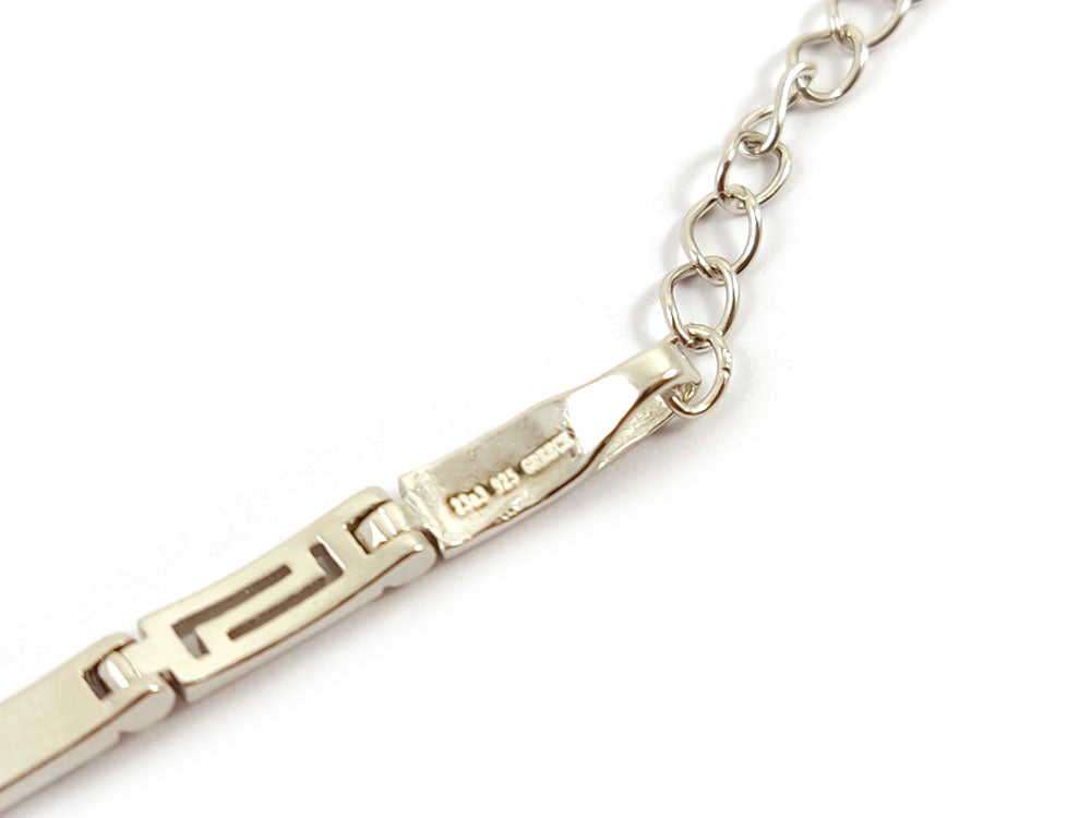 "Greek-inspired Sterling Silver bracelet with vibrant blue opal stones, 3mm width, adjustable fit, and timeless Meander pattern, hallmarked 925 silver."
