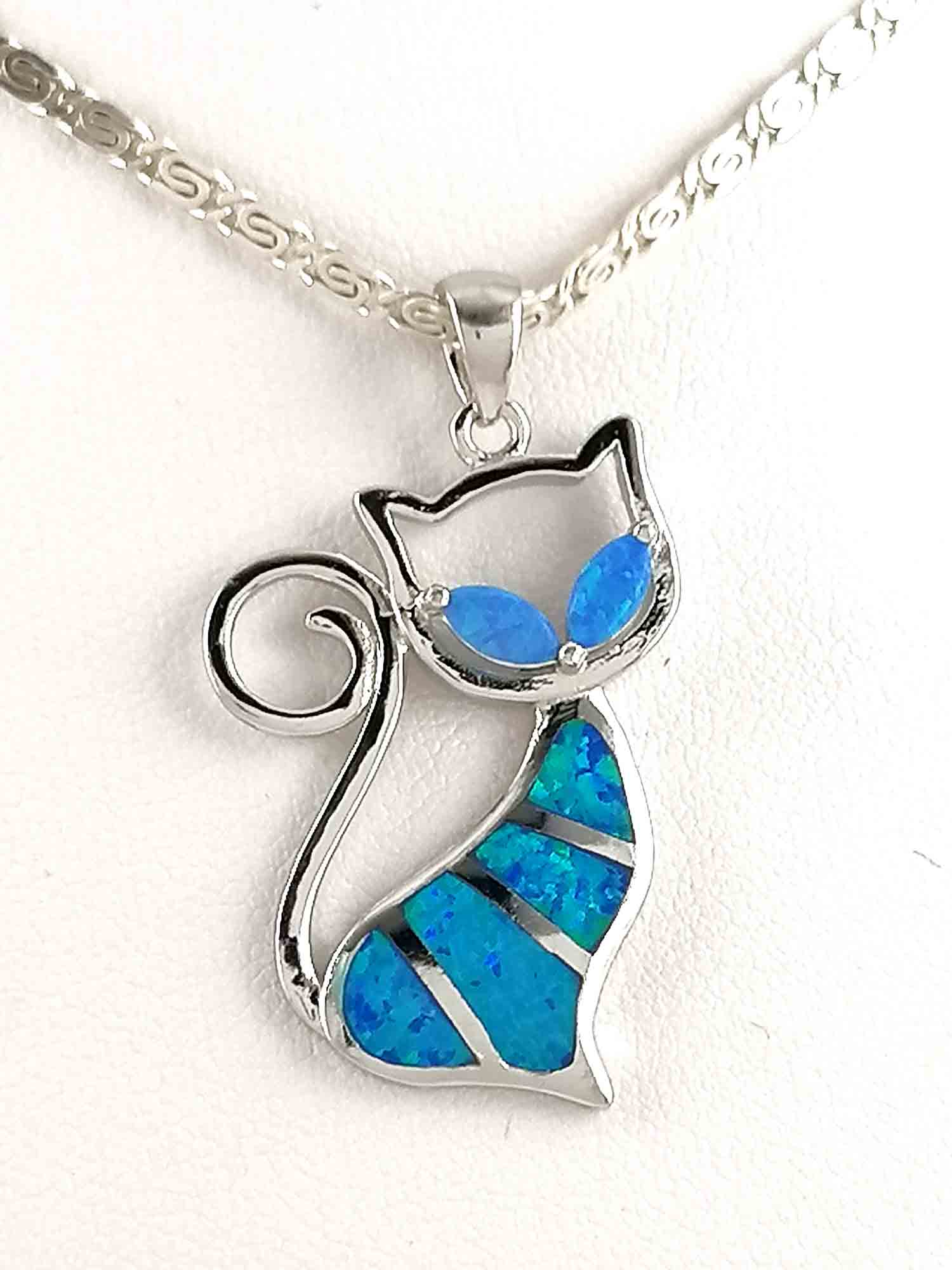 Silver cat pendant with blue opal stones from Greece and an optional silver chain with the infinity design.