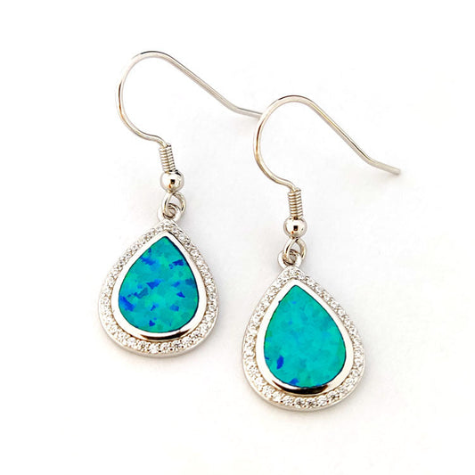 Teal opal earrings with silver hooks on a white background