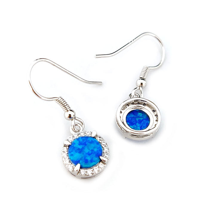 The back side of blue opal dangle round earrings showing the hallmark of 925 on white background.