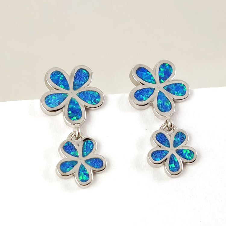 Close-up of Blue Opal Sterling Silver Stud Earrings – Elegant 925 sterling silver earrings with shimmering blue opal gemstones, handcrafted in Greece.