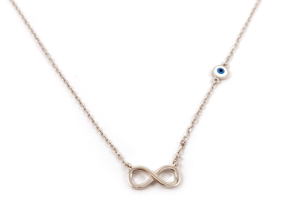 Close-up of a sterling silver 925 infinity design necklace featuring a 5 mm evil eye charm. Necklace length is adjustable from 40 to 43 cm. Set on a white background. Hallmark 925. Made in Greece. Free shipping worldwide.