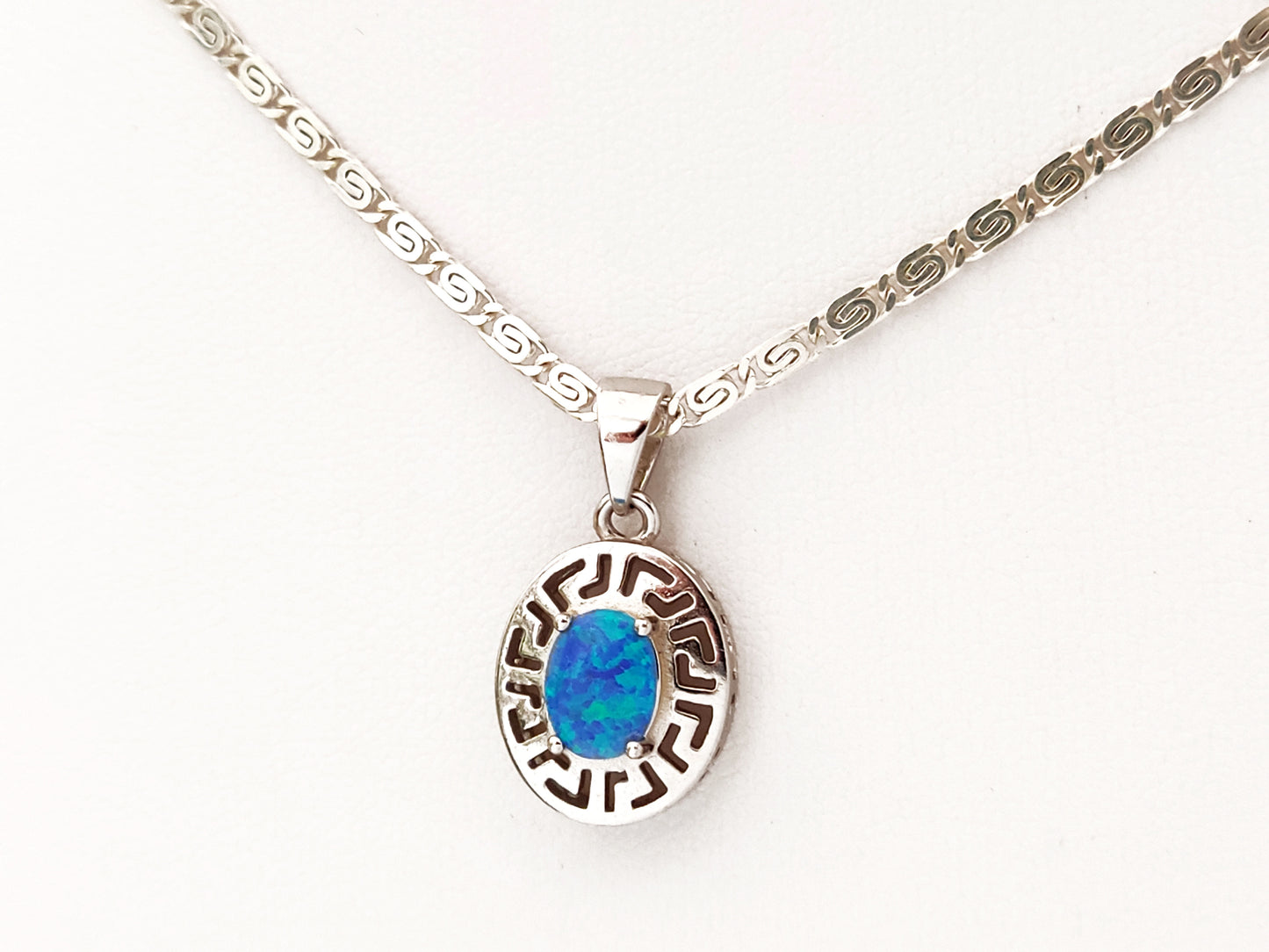 Greek key oval shape silver pendant measuring 15x13mm with Greek silver infinity design chain measuring 2mm.