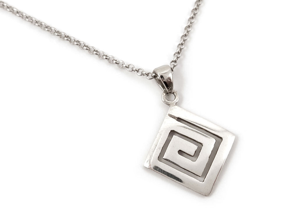 Sterling Silver 925 Pendant with Greek Key Meander Design – A square-shaped pendant made of sterling silver featuring a traditional Greek Key (Meander) design. The pendant measures 16 x 16 mm (0.62 x 0.62 inches) and hangs from a 2 mm (0.007 inch) wide sterling silver chain. Crafted in Greece, stamped with the hallmark 925.