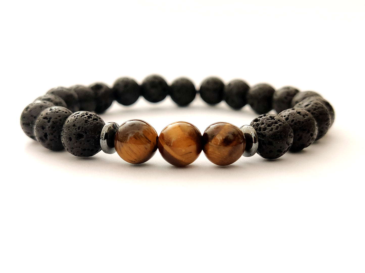 Greek volcanic lava and tiger's eye natural stones bracelet measuring 8mm in width on white background.