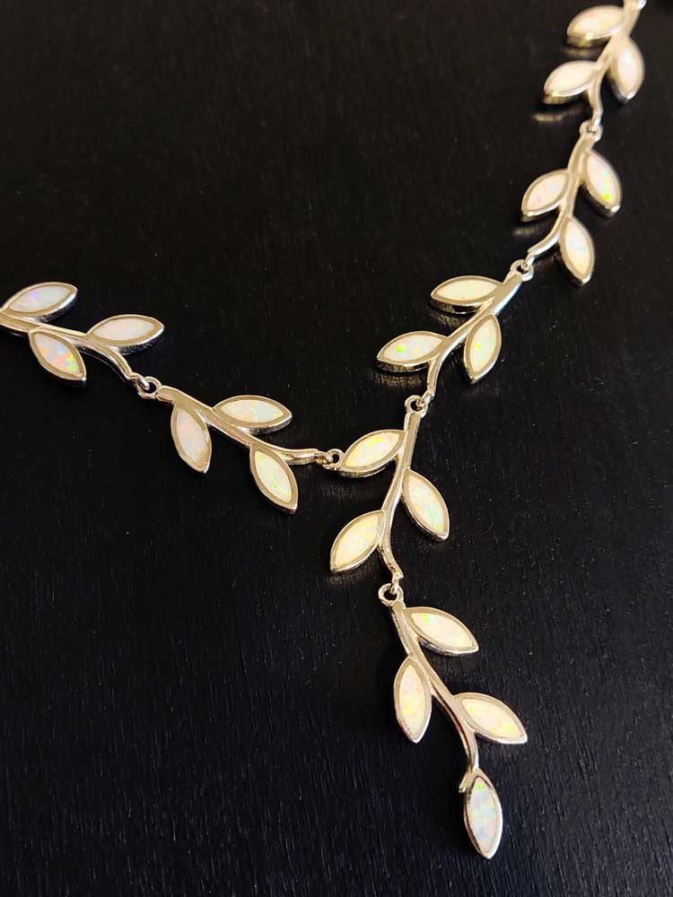 White opal silver Greek necklace with small leaves.