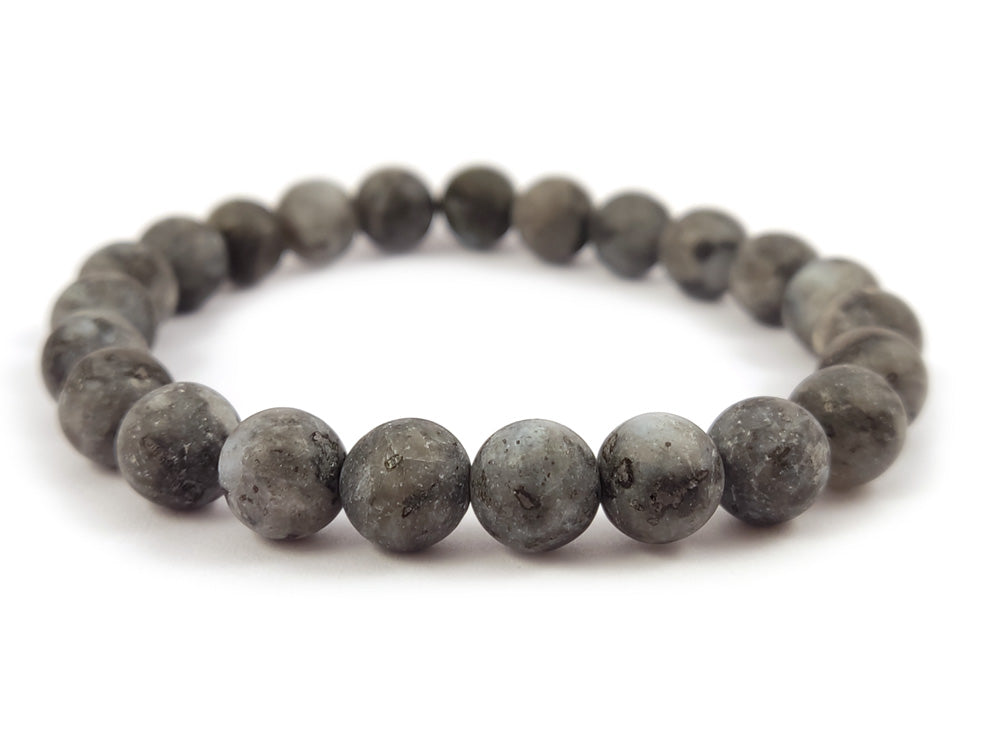 Close-up of a stylish gray matte Larvikite stone bracelet featuring natural 8mm beads, handmade in Greece.