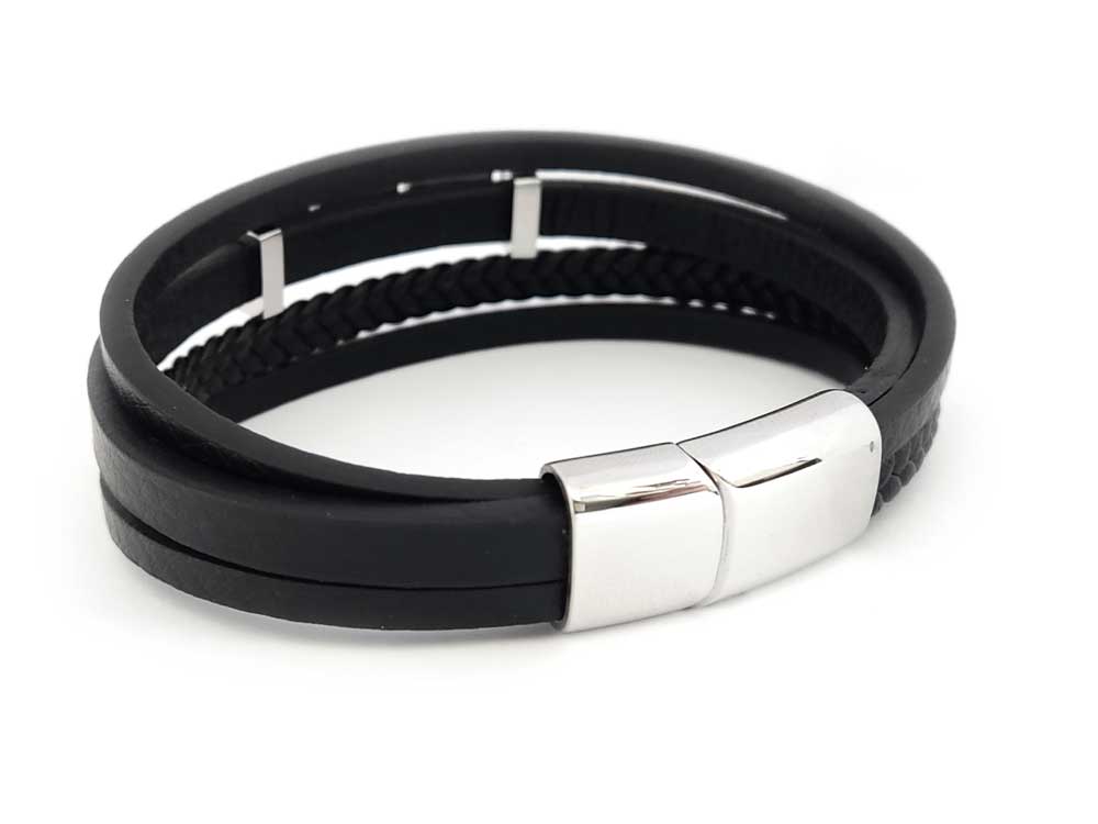 Layered Greek key bracelet on wrist – black leather with durable stainless steel accents