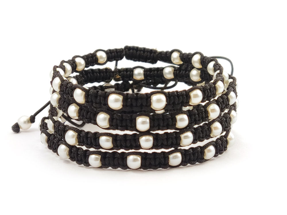 Close-up of handmade pearl macrame bracelet