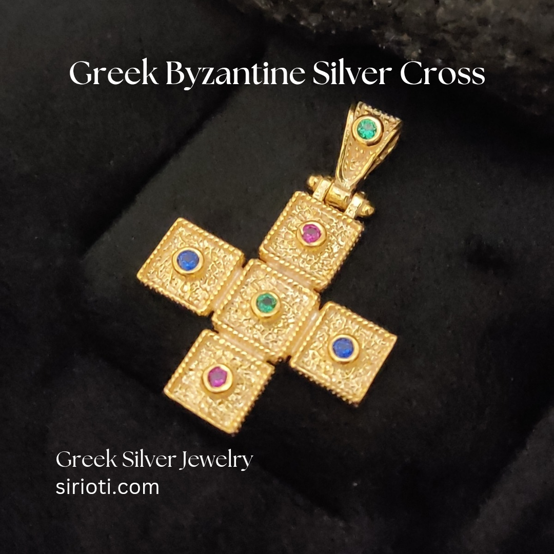 "Close-up of sterling silver 925 Greek cross pendant, gold finish, and traditional Byzantine style."