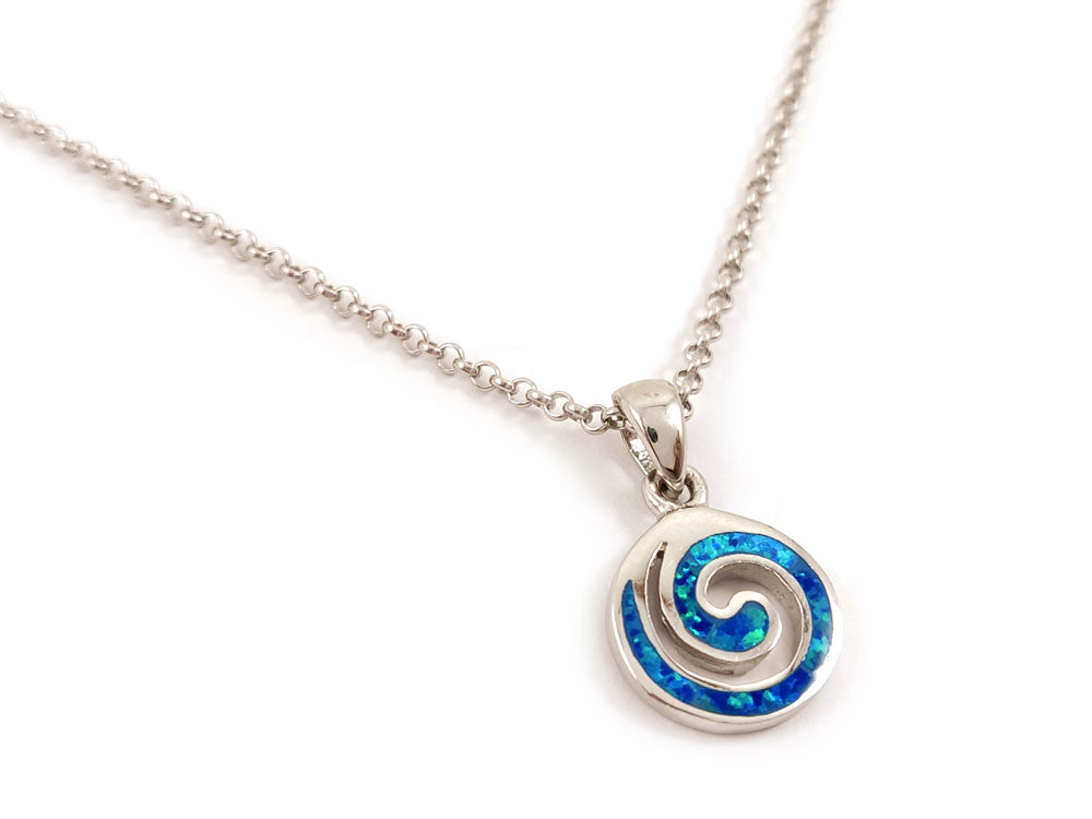 "Authentic Sterling Silver 925 pendant with a blue opal centerpiece, featuring Greek spiral design; hallmark925 ensures quality."
