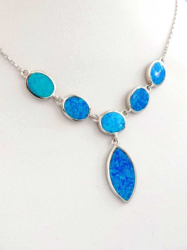 Sterling silver necklace with oval and drop-shaped blue opal stones
