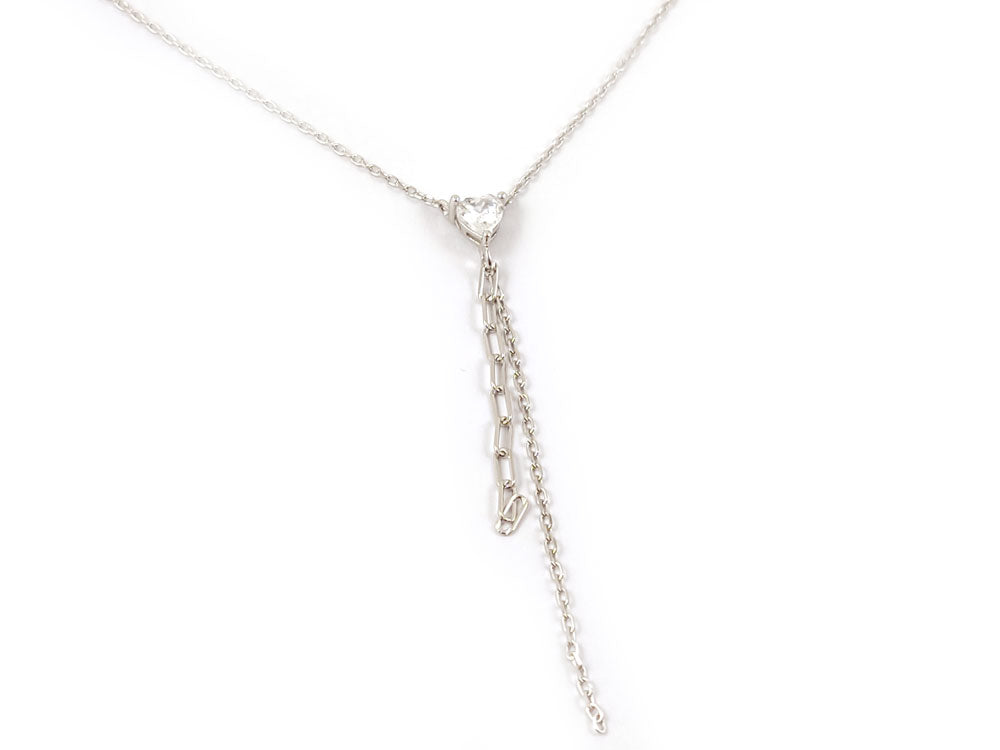"Minimalist and elegant silver tie chain necklace with a shimmering crystal heart pendant, perfect for everyday wear or special occasions."