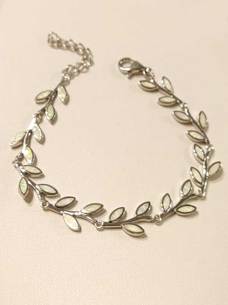 Close-up of adjustable silver opal leaf bracelet showing hallmarked 925 details