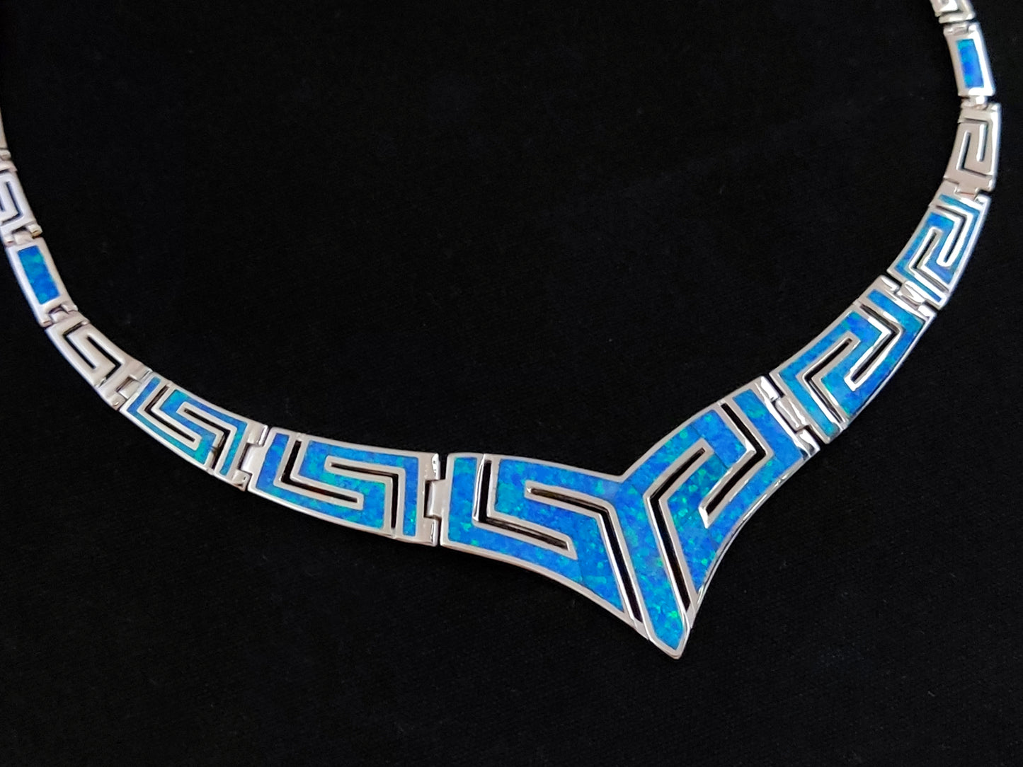 Stunning Sterling Silver Fire Rainbow Blue Opal Necklace with modern "V" design, handcrafted in Greece. Free shipping available.