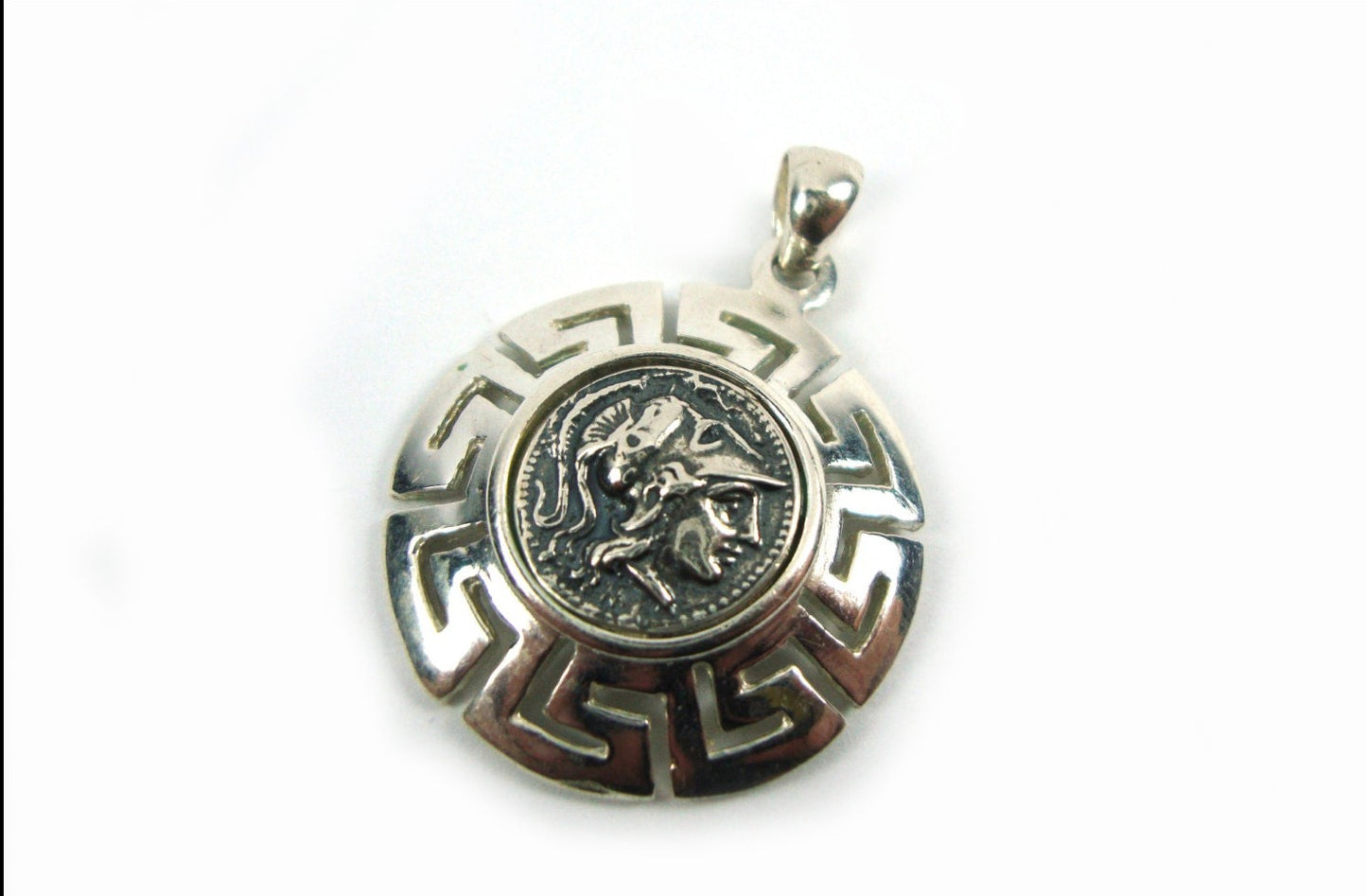Brand new Greek silver pendant that depicts a replica coin of goddess Athena surrounded by the Greek Key Meander design.