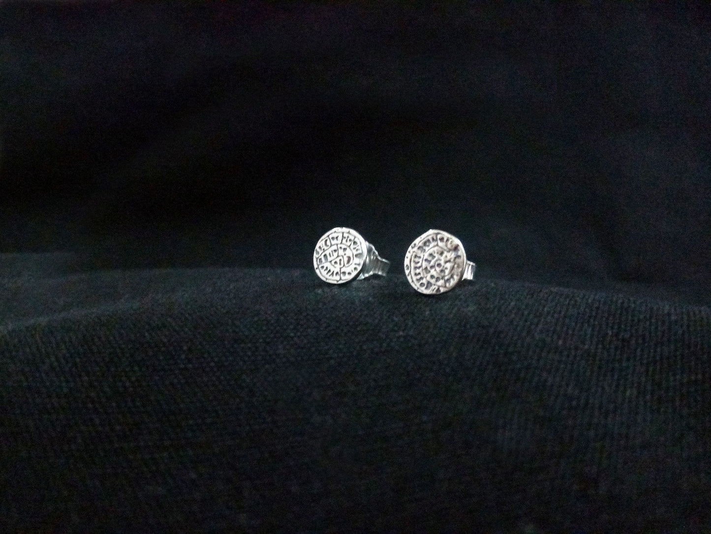 Greek silver small earrings with the Minoan Phaistos Disc pattern.