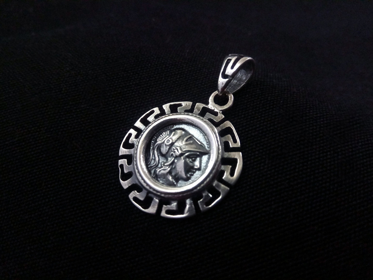 Gold-plated pendant featuring the Ancient Greek Goddess Athena motif on a background of the Infinity Key Meander design. Size: 21 mm. Crafted from Sterling Silver 925 in Greece. Hallmark 925. Free shipping.