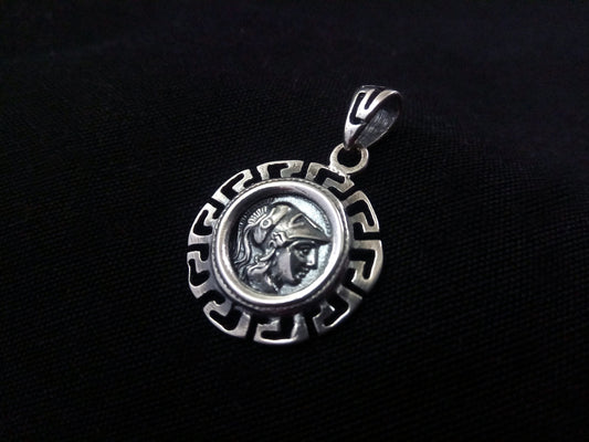 Gold-plated pendant featuring the Ancient Greek Goddess Athena motif on a background of the Infinity Key Meander design. Size: 21 mm. Crafted from Sterling Silver 925 in Greece. Hallmark 925. Free shipping.