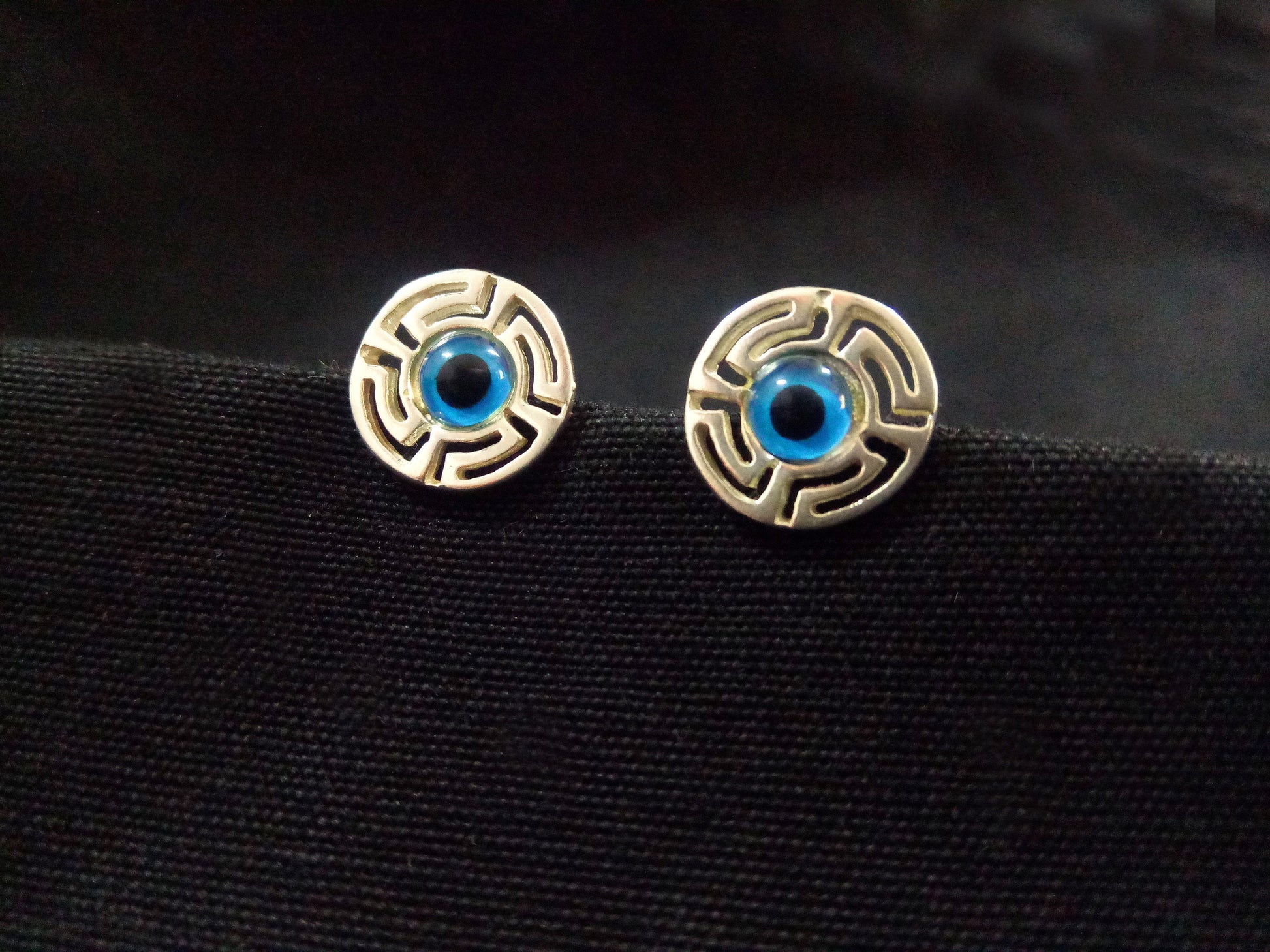 Image of Sterling Silver 925 Evil Eye Greek Turkish Round Meander Stud Earrings, featuring intricate Evil Eye motif, 12mm in diameter, from Sirioti Jewelry.
