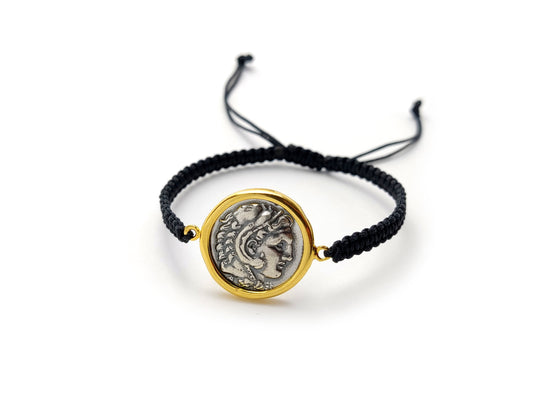 Image of a Sterling Silver 925 Alexander The Great Bracelet featuring a Gold Plated 22K Coin Frame, sized at 21mm (0.81 inches), with a Hallmark 925 stamp, handmade in Greece, and paired with a sleek black cord.