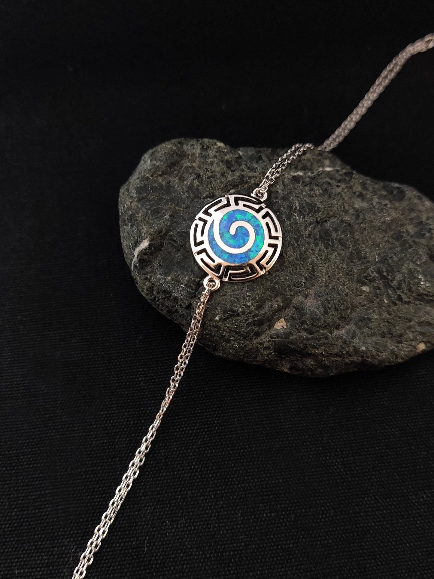 Silver Greek bracelet with blue opal stones and the infinity design from Greece.