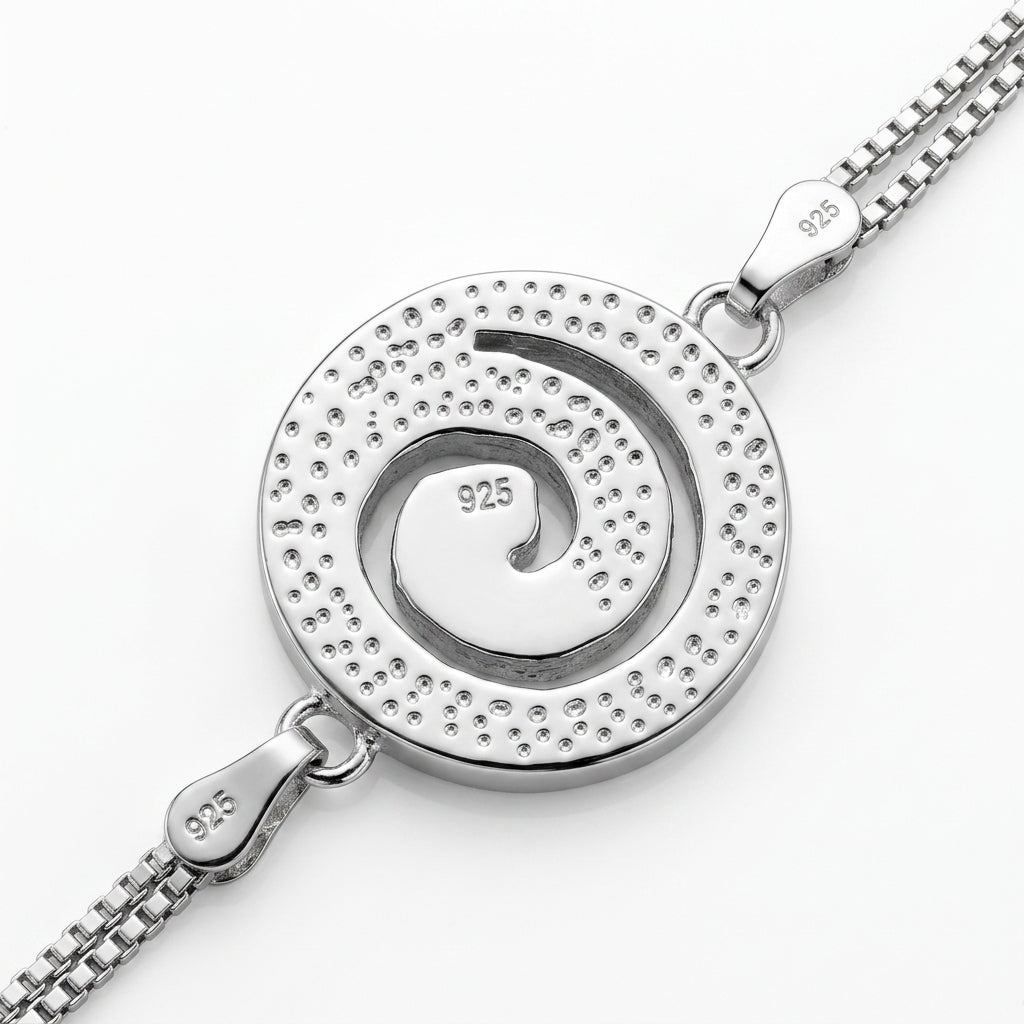 Close up of 925 hallmarked silver infinity spiral bracelet blue opal