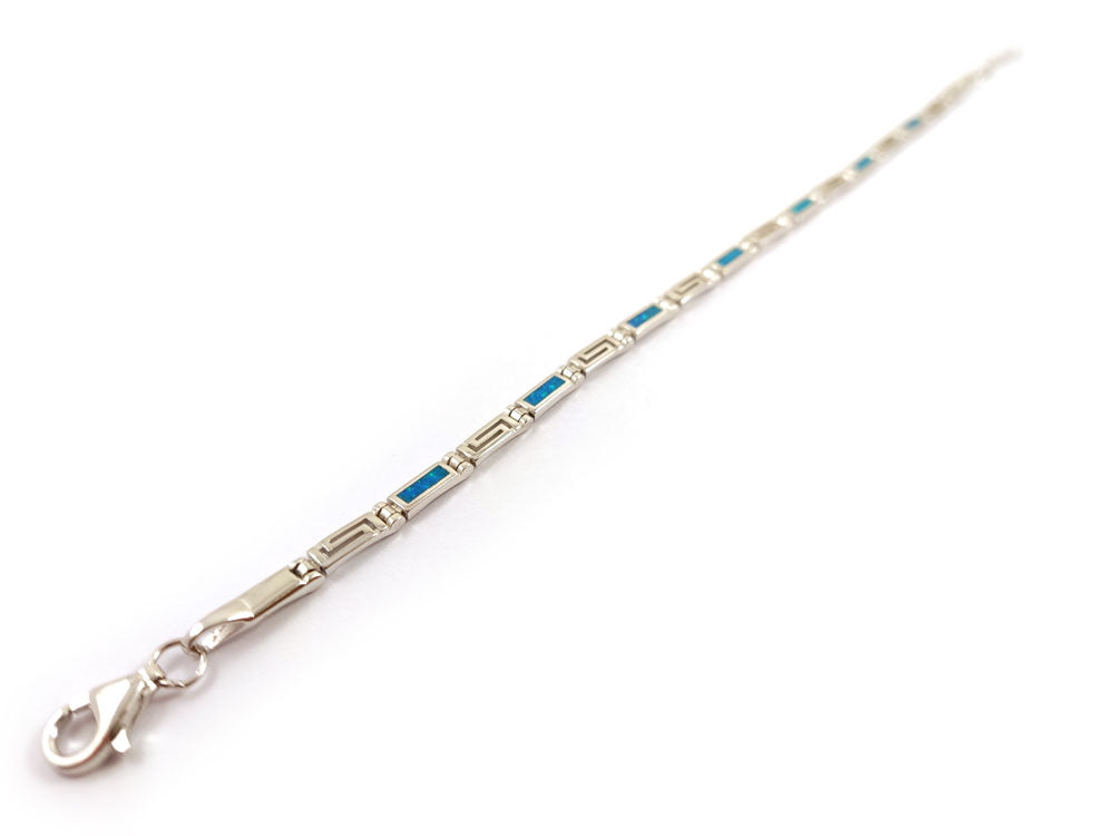 "Adjustable Greek Key bracelet in Sterling Silver 925, 3mm wide with striking blue opal accents, handcrafted in Greece, perfect for any occasion."

