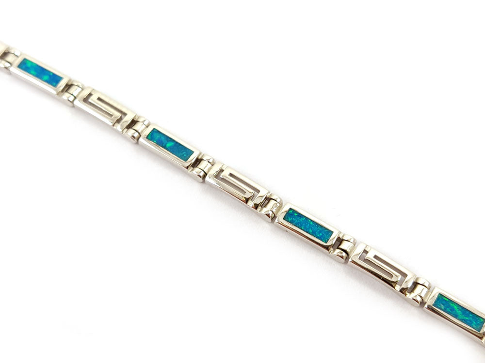 "Elegant Sterling Silver bracelet featuring Greek Key Meander design, blue opal stones, adjustable 18.5-21 cm length, 3mm wide, handcrafted in Greece."

