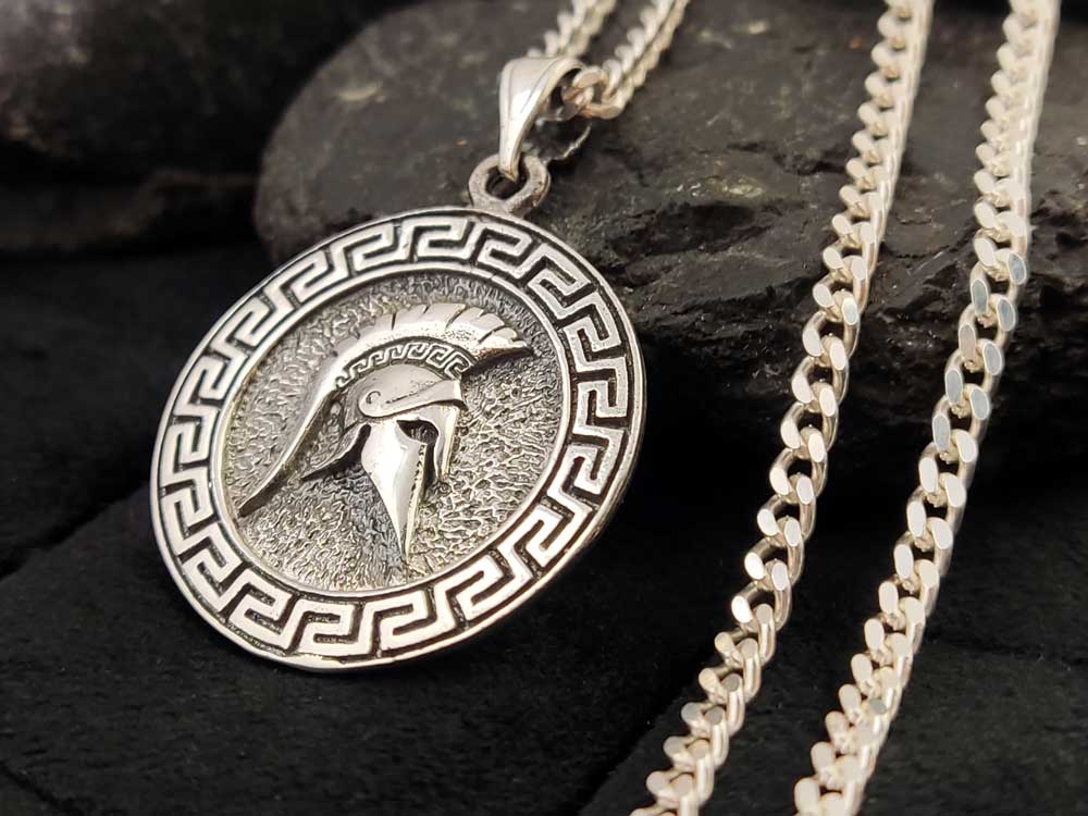 Sterling silver 925 pendant and chain set, with the Greek Key and helmet design, displayed flat to show the detailing.

