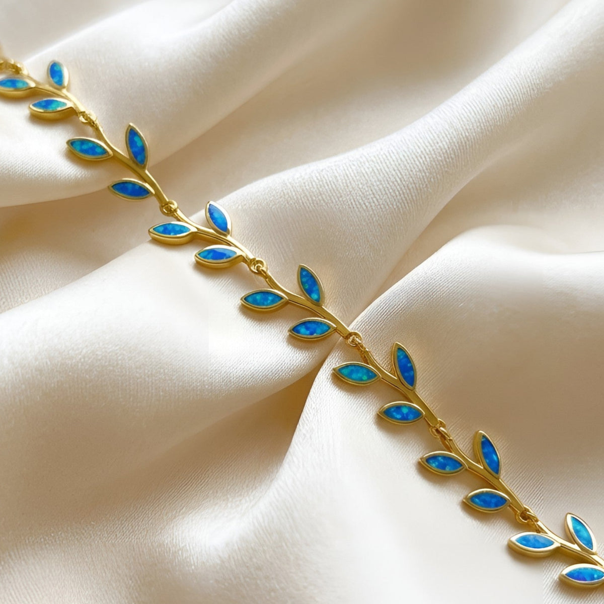 Greek silver jewelry bracelet with three olive leaves and blue opal