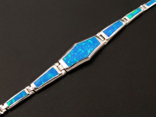Elevate style with Greek Blue Opal Silver Bracelet - Sterling Silver 925. Gradual design, free shipping. Authentic craftsmanship.