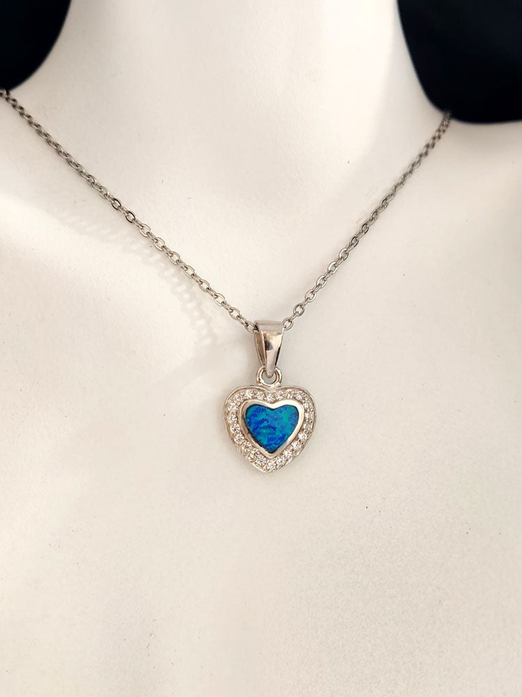 Close-up of Blue Opal and Cubic Zirconia Heart Pendant with hallmark 925