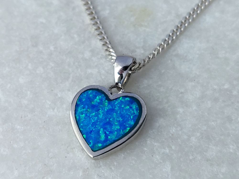 Sterling silver heart pendant with blue opal