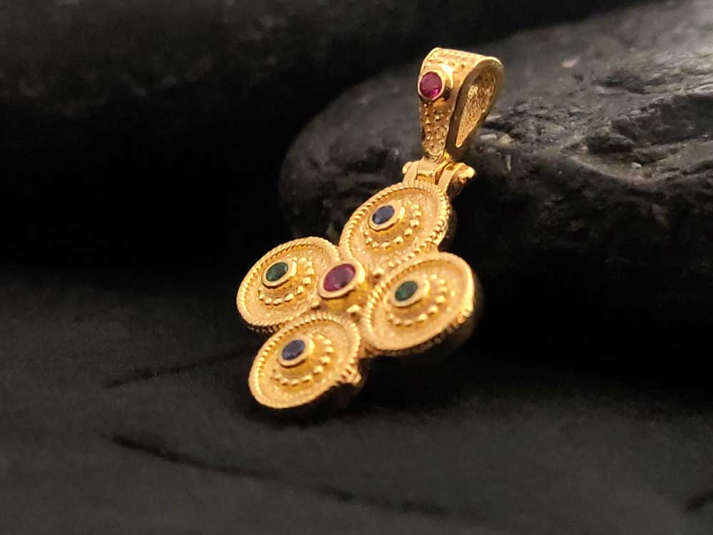 Elegant Byzantine Cross pendant with multicolor cubic zirconia stones, hallmarked 925, on a white background.
