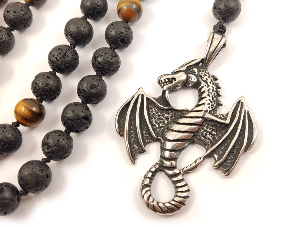 Adjustable-length necklace featuring bold natural stones and a detailed dragon pendant crafted in Greece.
