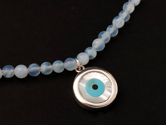 Greek necklace made of moonstone and silver evil eye pendant measuring 14mm.