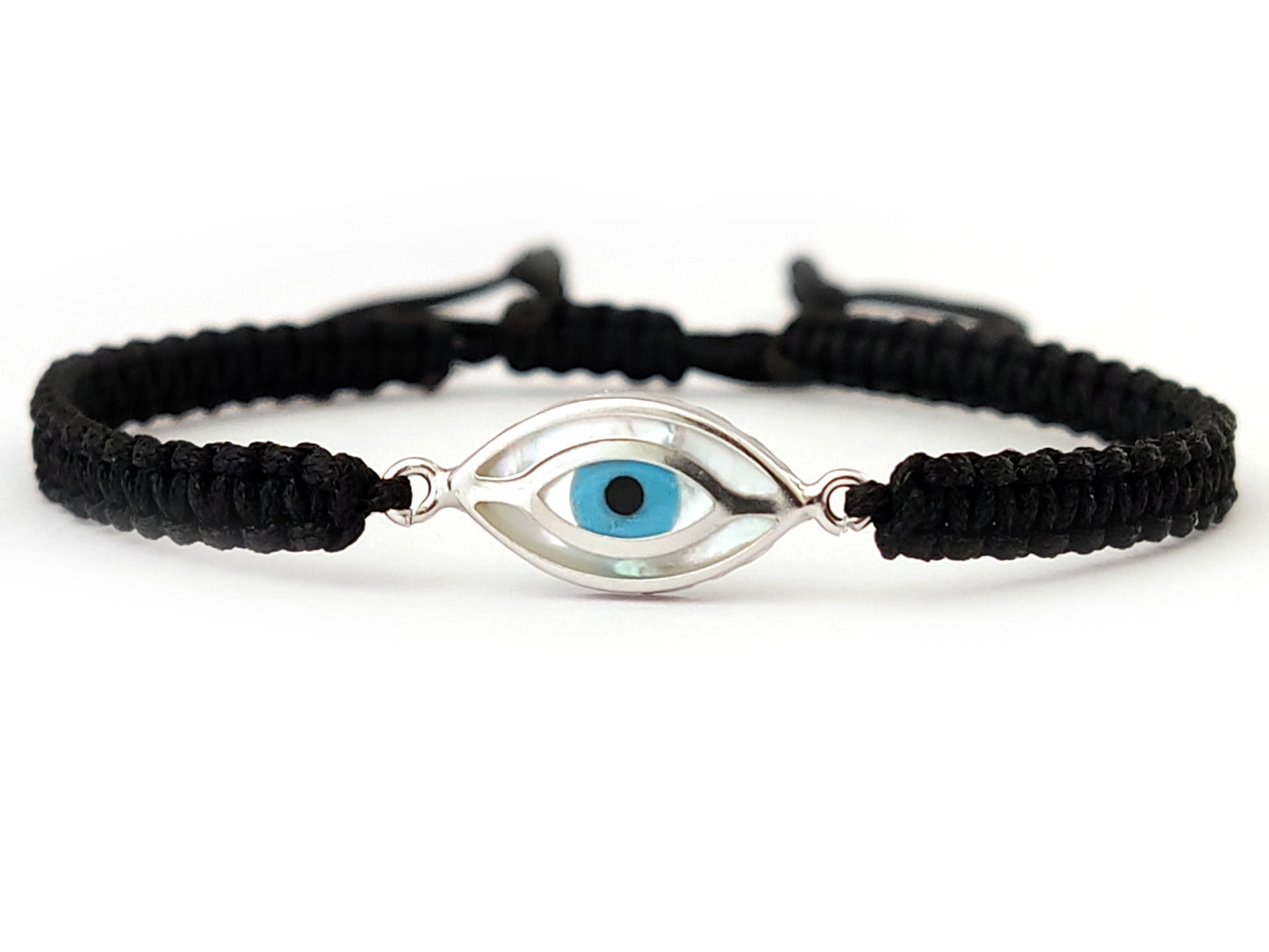 Handmade macrame Greek bracelet with silver evil eye and black cord.