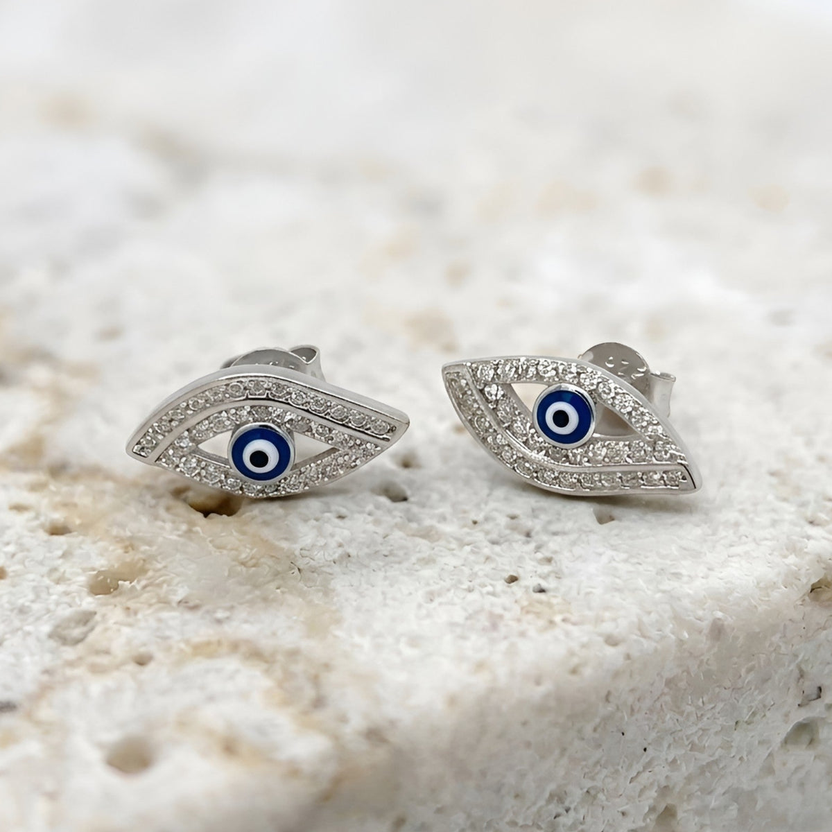 Small sterling silver evil eye earrings with sparkling cubic zirconia accents