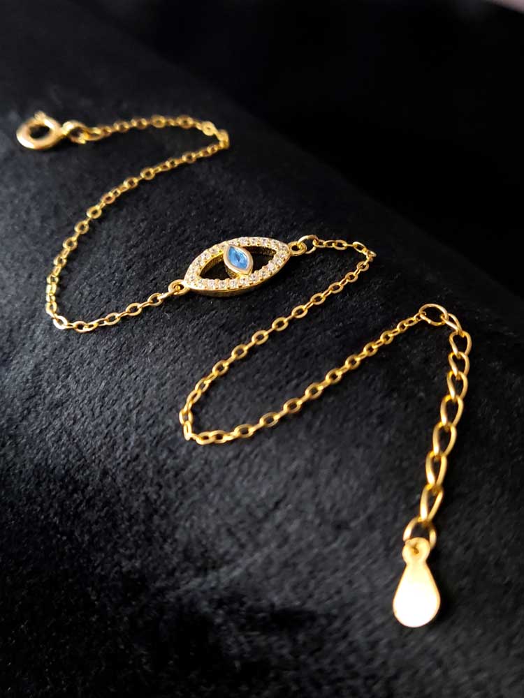 Close-up of Evil Eye Nazar bracelet in gold-plated sterling silver, hallmarked 925, made in Greece