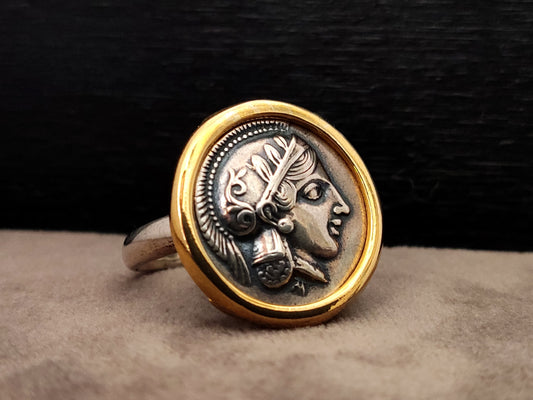 Close-up image of a Sterling Silver 925 Ring adorned with a Gold Plated Greek Goddess Athena Replica Coin, symbolizing strength, courage, and wisdom.