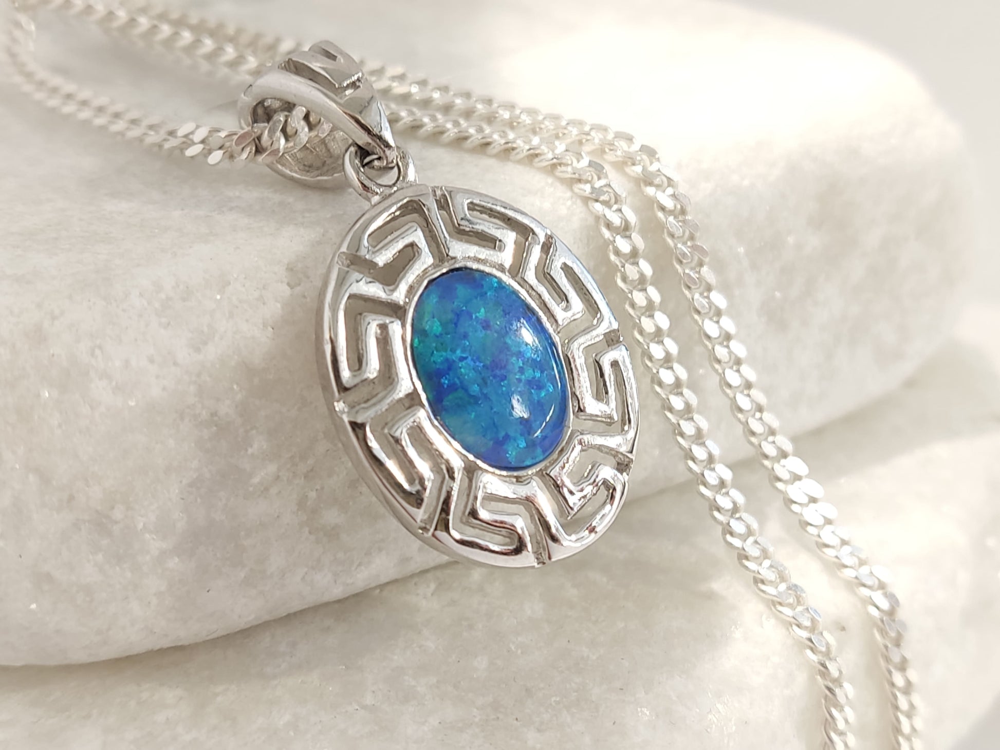Authentic Greek silver pendant featuring oval blue opal