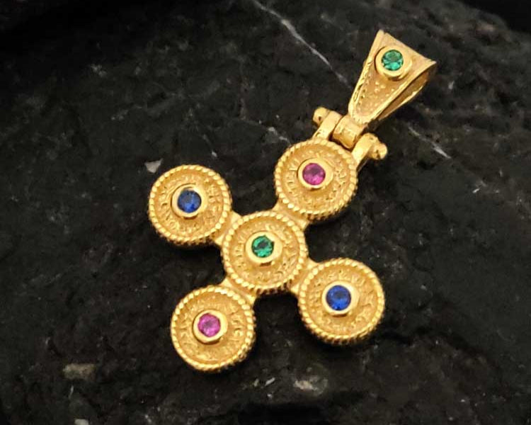 "Close-up of a Greek Byzantine cross pendant made of hallmarked Sterling Silver 925, adorned with vibrant multicolor cubic zirconia stones."
