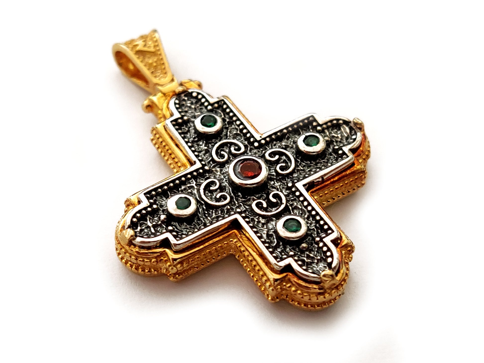 Handmade Greek byzantine cross with gold plated finish and red-green crystal stones. The cross measures 30x30mm and is made in Greece.
