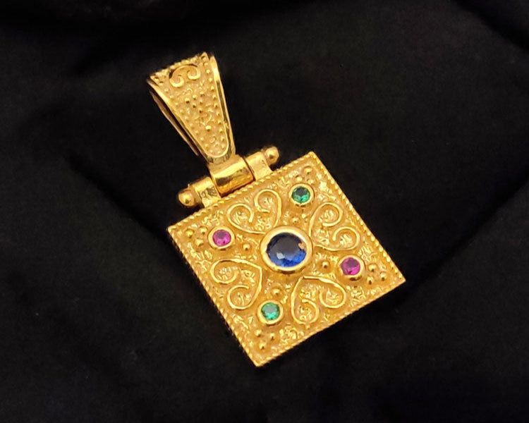 Close-up of a Sterling Silver 925 Greek Byzantine Pendant – A gold-plated handcrafted pendant with intricate Byzantine design, made in Greece.

