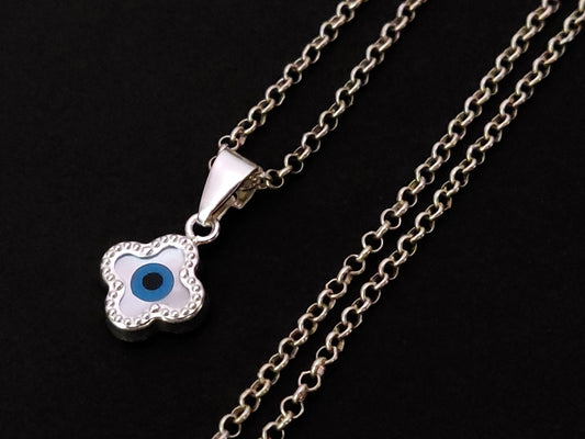 Close-up view of Sterling Silver 925 Greek Evil Eye Nazar Cross Pendant 9mm Necklace - Silver Evil Eye Jewelry.