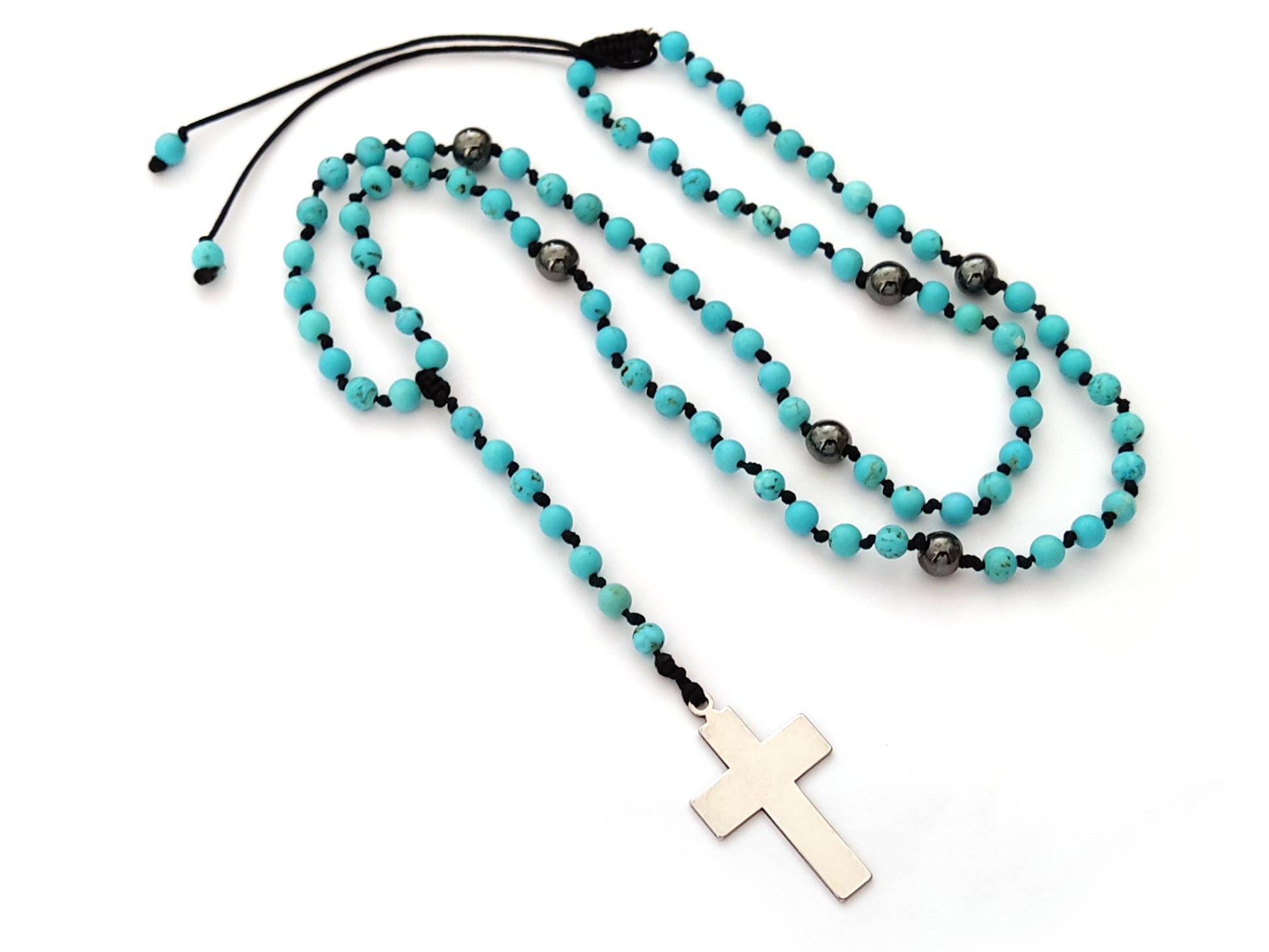 Rosary necklace made of natural tuquoise stones and stainless steek cross in Greece.