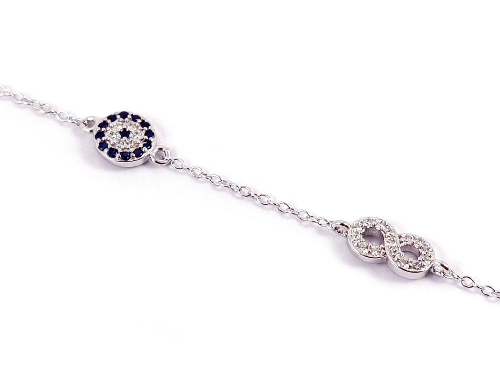 Elegant Evil Eye Infinity Bracelet in sterling silver, showcasing delicate craftsmanship and Greek artistry.
