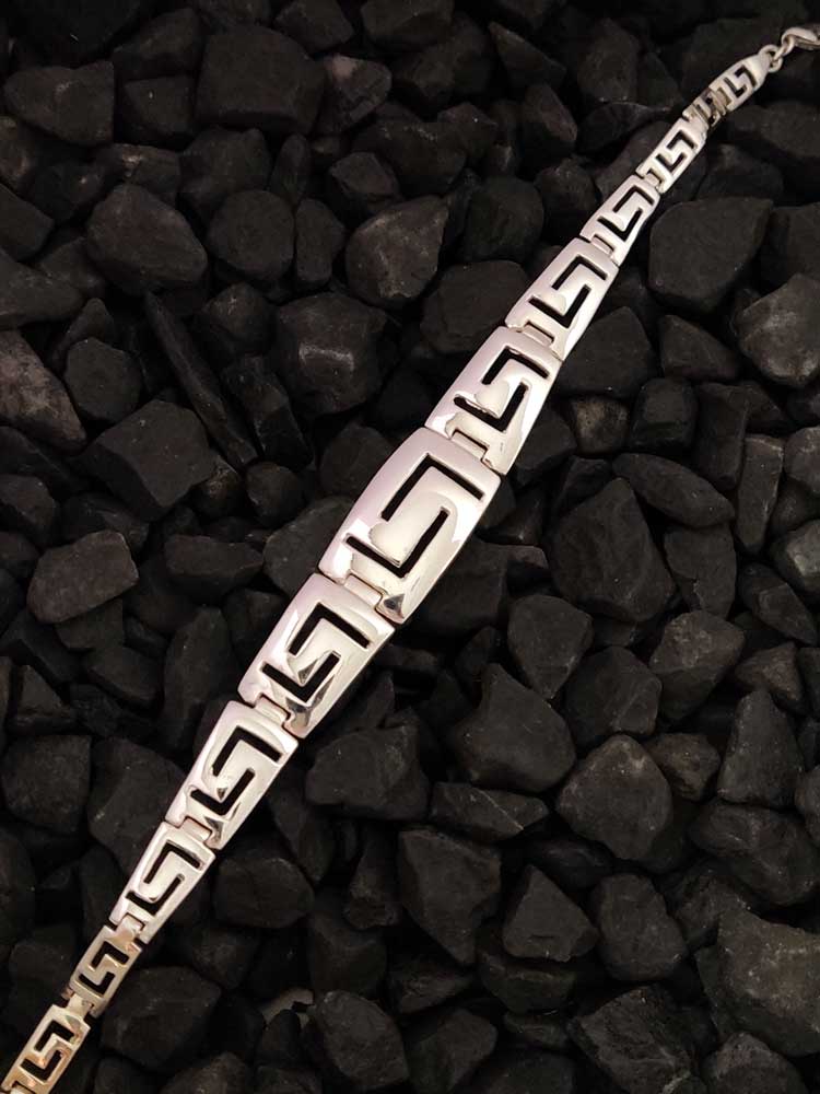 Bracelet en argent courbé progressif avec clé grecque