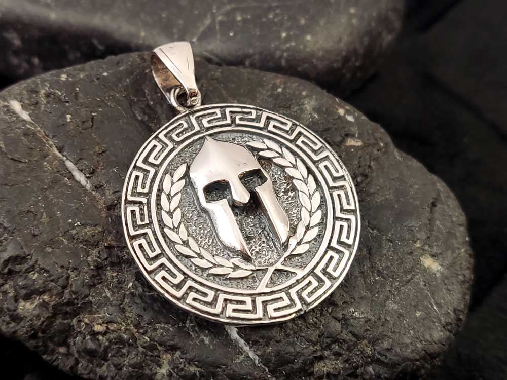 Handmade Greek Spartan Helmet Pendant – 25mm – A side-angle shot highlighting the intricate craftsmanship and hallmark 925 stamp.
